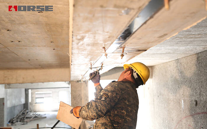 Prestressed CFRP Laminate To Reinforce The Underground Parking Lot