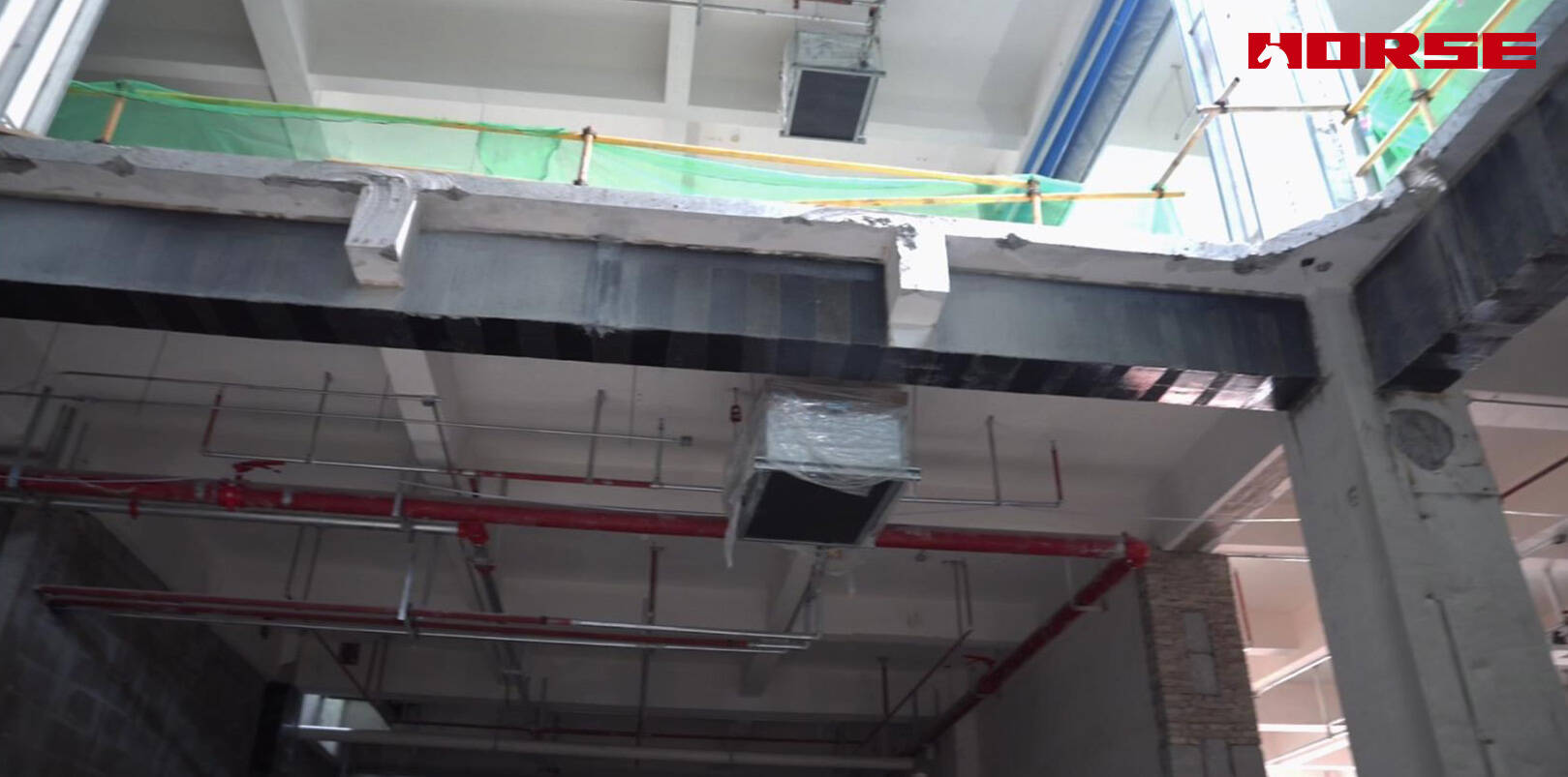 Structural Retrofit with Carbon Fiber after Floor Slab Demolition