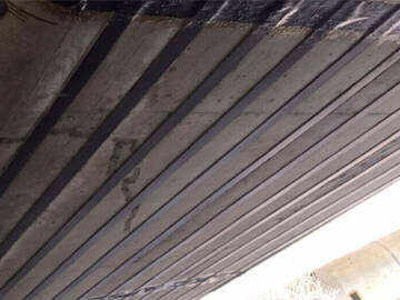 Maintenance and reinforcement of Xihe Bridge by steel plate